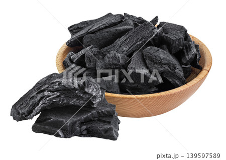 Natural charcoal in wooden bowl isolated on white background with full depth of field 139597589