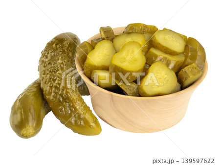 Marinated pickled cucumber in wooden bowl isolated on white background with full depth of field Marinated pickled cucumber in wooden bowl isolated on white background with full depth of field 139597622