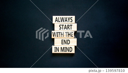 Start with the end in mind symbol. Concept words Always start with the end in mind on beautiful wooden blocks. Beautiful black paper background. Business start with the end in mind concept. Copy space 139597810