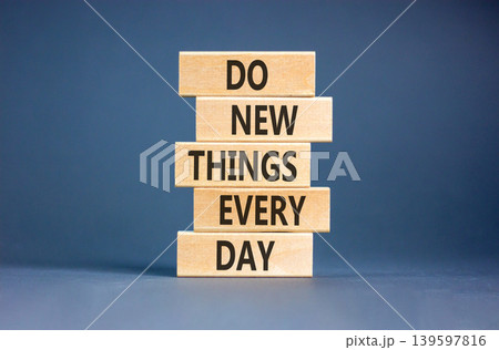 Do new things every day words symbol. Concept words Do new things every day on beautiful wooden blocks. Beautiful grey paper background. Business do new things every day concept. Copy space. Do new things every day words symbol. Concept words Do new things every day on beautiful wooden blocks. Beautiful grey paper background. Business do new things every day concept. Copy space. 139597816