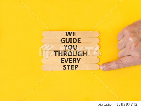 We guide you through every step symbol. Concept words We guide you through every step on wooden sticks. Beautiful yellow paper background. Business We guide you through every step concept. Copy space. We guide you through every step symbol. Concept words We guide you through every step on wooden sticks. Beautiful yellow paper background. Business We guide you through every step concept. Copy space. 139597842