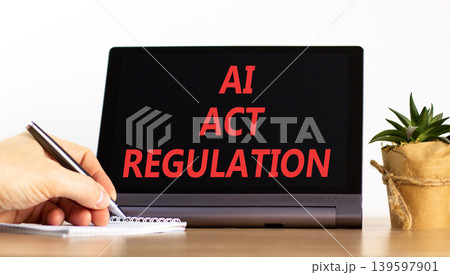AI act regulation words symbol. Concept words AI artificial intelligence act regulation on beautiful black tablet. Beautiful white background. Business AI act regulation concept. Copy space. AI act regulation words symbol. Concept words AI artificial intelligence act regulation on beautiful black tablet. Beautiful white background. Business AI act regulation concept. Copy space. 139597901
