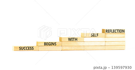 Self reflection symbol. Concept words Success begins with self reflection on beautiful wooden blocks. Beautiful white paper background. Business success begins with self reflection concept. Copy space 139597930