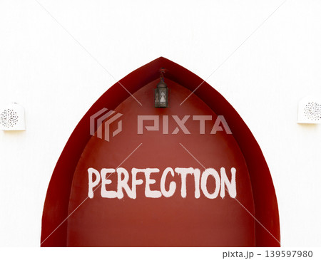 Perfection symbol. Concept word Perfection on beautiful red wall. Beautiful red and white wall background. Business perfection concept. Copy space. Perfection symbol. Concept word Perfection on beautiful red wall. Beautiful red and white wall background. Business perfection concept. Copy space. 139597980