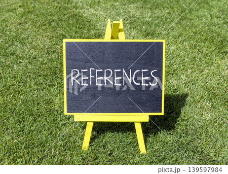 References or reference symbol. Concept word References on beautiful black blackboard. Beautiful green grass lawn background. Business references or reference concept. Copy space. References or reference symbol. Concept word References on beautiful black blackboard. Beautiful green grass lawn background. Business references or reference concept. Copy space. 139597984