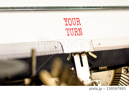 Your turn words symbol. Concept words Your turn typed on beautiful old retro typewriter. Beautiful white background. Business your turn motivational support concept. Copy space. Your turn words symbol. Concept words Your turn typed on beautiful old retro typewriter. Beautiful white background. Business your turn motivational support concept. Copy space. 139597993