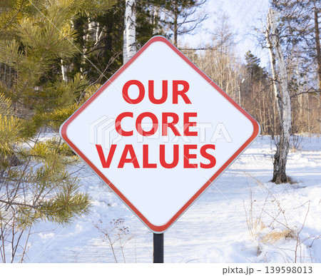Our core values words symbol. Concept words Our core values on beautiful white road sign. Beautiful winter forest background. Business our core values motivational support concept. Copy space. 139598013