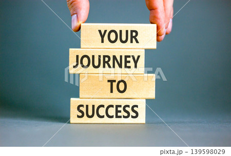 Your journey to success words symbol. Concept words Your journey to success on beautiful wooden blocks. Beautiful grey background. Business motivational your journey to success concept. Copy space. Your journey to success words symbol. Concept words Your journey to success on beautiful wooden blocks. Beautiful grey background. Business motivational your journey to success concept. Copy space. 139598029