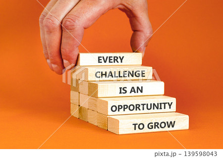 Challenge word symbol. Concept words Every challenge is an opportunity to grow on beautiful wooden blocks. Beautiful orange paper background. Business challenge is an opportunity concept. Copy space. Challenge word symbol. Concept words Every challenge is an opportunity to grow on beautiful wooden blocks. Beautiful orange paper background. Business challenge is an opportunity concept. Copy space. 139598043