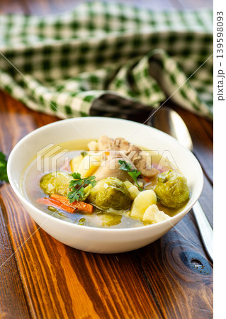 traditional chicken soup with brussels sprouts and fresh parsley traditional chicken soup with brussels sprouts and fresh parsley 139598093