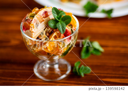 layered coffee fruit jelly dessert in glass bowl with mint layered coffee fruit jelly dessert in glass bowl with mint 139598142