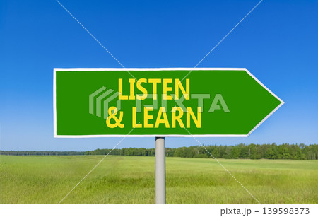 Listen and learn words symbol. Concept words Listen and learn on beautiful green road sign. Beautiful blue sky green field background. Business listen and learn support concept. Copy space. Listen and learn words symbol. Concept words Listen and learn on beautiful green road sign. Beautiful blue sky green field background. Business listen and learn support concept. Copy space. 139598373