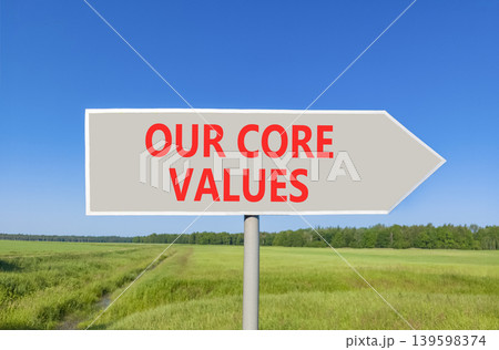 Our core values words symbol. Concept words Our core values on beautiful grey road sign. Beautiful blue sky green field background. Business our core values motivational support concept. Copy space. Our core values words symbol. Concept words Our core values on beautiful grey road sign. Beautiful blue sky green field background. Business our core values motivational support concept. Copy space. 139598374