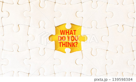 What do you think words symbol. Concept words What do you think on beautiful yellow paper. Beautiful white puzzles background. Business What do you think motivational support concept. Copy space. What do you think words symbol. Concept words What do you think on beautiful yellow paper. Beautiful white puzzles background. Business What do you think motivational support concept. Copy space. 139598384