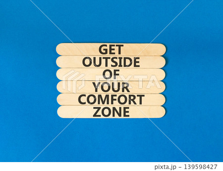 Leave your comfort zone symbol. Concept words Get outside of your comfort zone on beautiful wooden stick. Beautiful blue background. Business psychological Leave comfort zone concept. Copy space. Leave your comfort zone symbol. Concept words Get outside of your comfort zone on beautiful wooden stick. Beautiful blue background. Business psychological Leave comfort zone concept. Copy space. 139598427