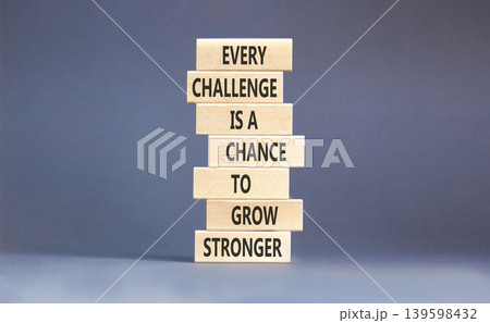 Challenge word symbol. Concept words Every challenge is a chance to grow stronger on beautiful wooden blocks. Beautiful grey paper background. Business challenge is opportunity concept. Copy space. 139598432