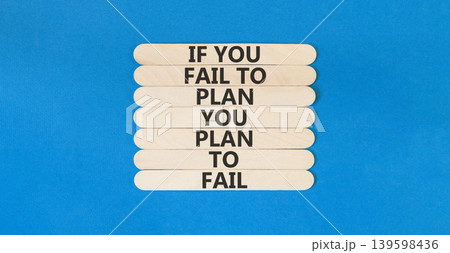 Planning to fail symbol. Concept words If you fail to plan you plan to fail on beautiful wooden sticks. Beautiful blue paper background. Business planning to fail concept. Copy space. Planning to fail symbol. Concept words If you fail to plan you plan to fail on beautiful wooden sticks. Beautiful blue paper background. Business planning to fail concept. Copy space. 139598436