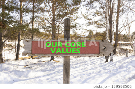 Our core values words symbol. Concept words Our core values on beautiful wooden road sign. Beautiful snow forest background. Business our core values motivational support concept. Copy space. 139598506