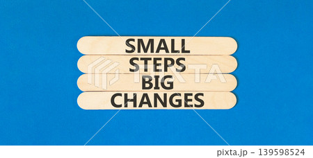 Small steps big changes words symbol. Concept words Small steps big changes on beautiful wooden sticks. Beautiful blue background. Business motivational small steps big changes concept. Copy space. Small steps big changes words symbol. Concept words Small steps big changes on beautiful wooden sticks. Beautiful blue background. Business motivational small steps big changes concept. Copy space. 139598524