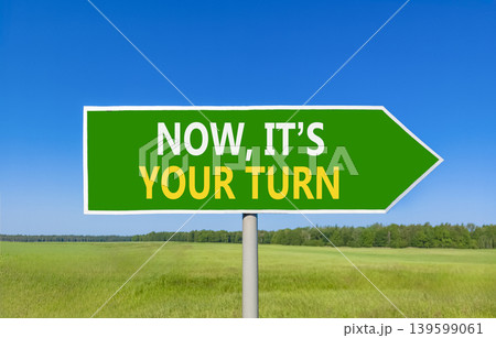 Now it's your turn words symbol. Concept words Now it's your turn on beautiful green road sign. Beautiful blue sky background. Business Now it's your turn motivational support concept Copy space 139599061