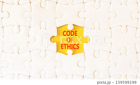 Code of ethics words symbol. Concept words Code of ethics on beautiful yellow paper. Beautiful white puzzles background. Business Code of ethics concept. Copy space. Code of ethics words symbol. Concept words Code of ethics on beautiful yellow paper. Beautiful white puzzles background. Business Code of ethics concept. Copy space. 139599199