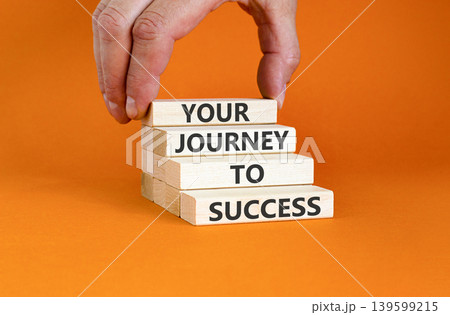 Your journey to success words symbol. Concept words Your journey to success on beautiful wooden blocks. Beautiful orange background. Business motivational your journey to success concept. Copy space. Your journey to success words symbol. Concept words Your journey to success on beautiful wooden blocks. Beautiful orange background. Business motivational your journey to success concept. Copy space. 139599215