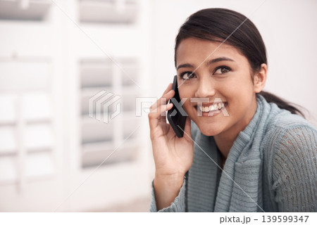 Happy woman in bedroom with phone call, relax and communication with mobile connection in apartment. Gen z girl in bedroom with smile, talking on cellphone and conversation for networking in home. Happy woman in bedroom with phone call, relax and communication with mobile connection in apartment. Gen z girl in bedroom with smile, talking on cellphone and conversation for networking in home. 139599347
