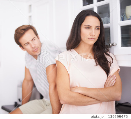 Angry, woman and man fight with conflict or drama in life, mistake or marriage fail, anxiety and stress at home. Frustrated couple argue in kitchen, cheating problem or crisis with risk of divorce Angry, woman and man fight with conflict or drama in life, mistake or marriage fail, anxiety and stress at home. Frustrated couple argue in kitchen, cheating problem or crisis with risk of divorce 139599476