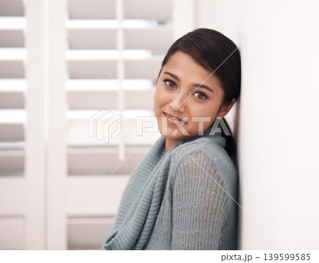 Woman, portrait and smile in a new home on the floor and carpet relax in the morning. Lounge, happy face and female person from India with living room, real estate and calm in a house by a wall 139599585