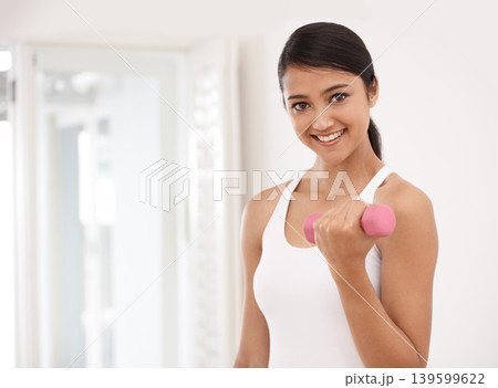 Woman, portrait and dumbbells for fitness at gym, workout and strong biceps or muscle growth. Happy female person, smiling and weightlifting or exercise and training, equipment and tools for athlete Woman, portrait and dumbbells for fitness at gym, workout and strong biceps or muscle growth. Happy female person, smiling and weightlifting or exercise and training, equipment and tools for athlete 139599622