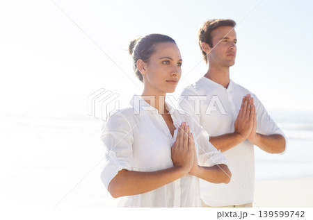 Yoga, meditation and summer with couple on beach together for wellness, zen or holistic exercise. Travel, awareness or mindfulness with young man and woman by sea or ocean for balance and inner peace Yoga, meditation and summer with couple on beach together for wellness, zen or holistic exercise. Travel, awareness or mindfulness with young man and woman by sea or ocean for balance and inner peace 139599742