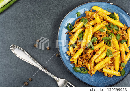 Homemade penne with fried ground meat and herbs Homemade penne with fried ground meat and herbs 139599938