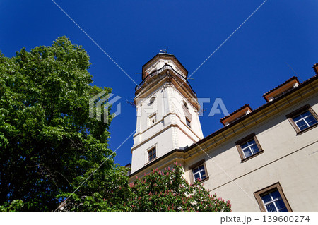 Astronomical Tower of the Klementinum in Prague with Atlant statue holding heavens, Czech Republic, clear blue sky, sunny day 139600274
