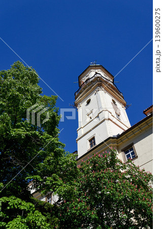 Astronomical Tower of the Klementinum in Prague with Atlant statue holding heavens, Czech Republic, clear blue sky, sunny day Astronomical Tower of the Klementinum in Prague with Atlant statue holding heavens, Czech Republic, clear blue sky, sunny day 139600275
