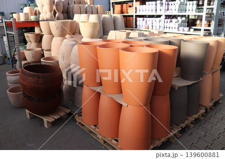 A wide selection of clay and ceramic plant pots on pallets. A wide selection of clay and ceramic plant pots on pallets. 139600881