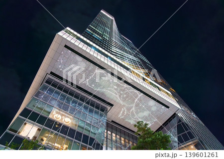 Tokyo, Japan - Oct 1 2024, Panoramic view from below of the Toranomon Hills tower, at night with illumination, Tokyo, Japan Tokyo, Japan - Oct 1 2024, Panoramic view from below of the Toranomon Hills tower, at night with illumination, Tokyo, Japan 139601261