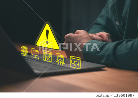 Warning alert and technical error on laptop. Computer security, system problem, and data technology concept with yellow icons on laptop keyboard. Warning alert and technical error on laptop. Computer security, system problem, and data technology concept with yellow icons on laptop keyboard. 139601997