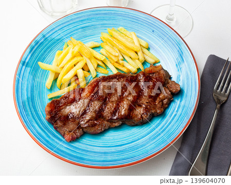 Homemade grilled beef steak with fried potato 139604070
