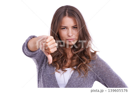Thumbs down, portrait and hands of woman in studio for rejection of bad news, emoji sign and vote no for feedback on white background. Unhappy model show negative review, wrong decision and failure Thumbs down, portrait and hands of woman in studio for rejection of bad news, emoji sign and vote no for feedback on white background. Unhappy model show negative review, wrong decision and failure 139605576