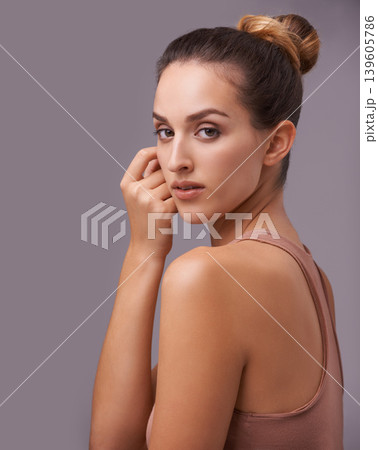 Portrait of woman, face or skincare dermatology, facial beauty or cosmetics for healthy glow. Isolated results, mockup or confident model with natural shine or wellness in studio on purple background Portrait of woman, face or skincare dermatology, facial beauty or cosmetics for healthy glow. Isolated results, mockup or confident model with natural shine or wellness in studio on purple background 139605786