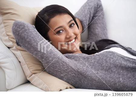 Relax, woman and sofa with portrait, smile and happy from nap and rest in the morning at home. Living room, lounge and couch with a female person from India on a break with peace and calm in house 139605879