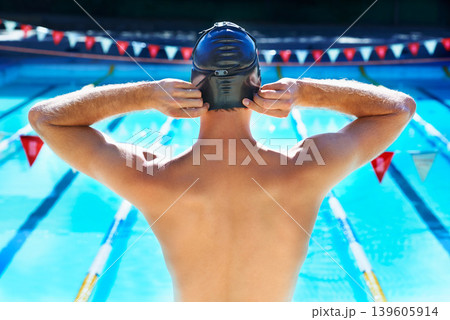 Swimming pool, fitness and back of sports person ready for exercise, outdoor workout or training. Waterpolo player, athlete or active swimmer to start challenge, race or practice for triathlon 139605914
