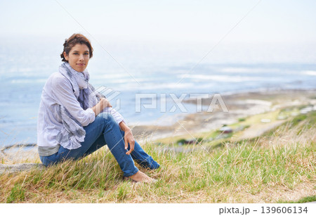 Mature, woman and relax in nature with portrait in landscape with gratitude and peace on holiday or vacation. Retirement, mock up and person on a hill at the beach, ocean or sea with ideas for future Mature, woman and relax in nature with portrait in landscape with gratitude and peace on holiday or vacation. Retirement, mock up and person on a hill at the beach, ocean or sea with ideas for future 139606134