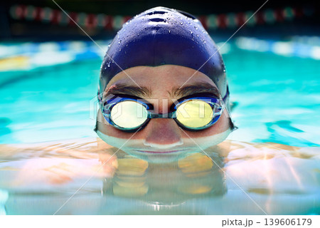 Swimming pool, goggles and sports man face for fitness exercise, outdoor workout or practice for race. Swimwear, wellness and wet swimmer doing waterpolo stroke, active cardio or training 139606179