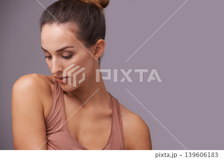 Woman thinking, face or beauty space for cosmetics or skincare dermatology for healthy glow. Isolated results, mockup or confident model with natural shine or wellness in studio on purple background Woman thinking, face or beauty space for cosmetics or skincare dermatology for healthy glow. Isolated results, mockup or confident model with natural shine or wellness in studio on purple background 139606183