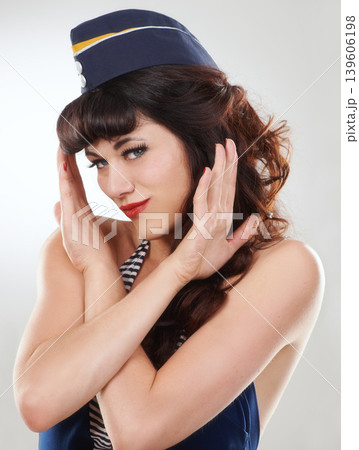 Portrait, sailor woman and stop hands of model in studio isolated on white background. Face, no or rejection of vintage pin up girl in hat with gesture sign for travel prohibition, warning or caution 139606198