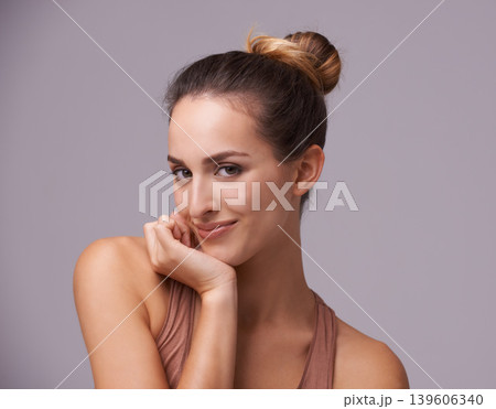 Skincare, beauty and portrait of woman in a studio with health, wellness and dermatology routine. Cosmetic, confident and female person with natural facial treatment isolated by gray background. Skincare, beauty and portrait of woman in a studio with health, wellness and dermatology routine. Cosmetic, confident and female person with natural facial treatment isolated by gray background. 139606340