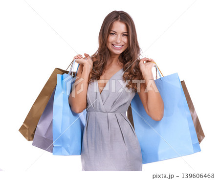 Portrait, woman and shopping bag in studio for retail sales, commerce savings or reward of financial freedom on white background. Happy customer with gift bags for fashion deal, discount or promotion 139606468