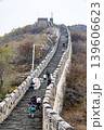 Unrecognizable tourists walking towards Tower 20 known as Hero's Slope in Mutianyu section of Great Wall 139606623