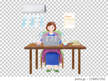 冷房の効いた部屋で寒さに耐えながら机でパソコンを開き仕事をする女性 139607392